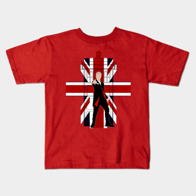 12th Doctor with Union jack Phone booth Kids T-Shirt by Dezigner007